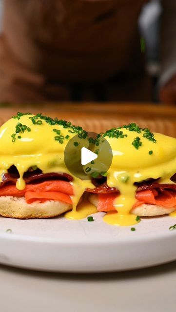 Dwight Smith on Instagram: "The Ultimate Eggs Benny! This was an incredible combination of flavours. Creamy avocado, salty crispy bacon, the smokiness from the salmon, plus fresh English muffins and hollandaise sauce. The only thing that could take this over the top was the local @eggfarmersont eggs. DYK eggs go from the farm to the grocery store shelves in only 4-7, game changer!

7 Ontario eggs (2 for poaching/4-5 yolks for hollandaise sauce)
3 strips of bacon
1/2 avocado, sliced
4 pieces smoked salmon
1 tbsp olive oil
1/4 cup white vinegar
1/2 bunch chives, chopped
1/2 lemon, juiced
1 tsp Tabasco
1 tsp Worcestershire
1 tsp salt
1 tsp cracked black pepper

Method: Heat oven to 350f. Cook bacon for 10-12 mins. In a pot on medium low heat, melt butter and clarify for 15 mins. Remove from h Salmon Poached, Grocery Store Shelves, Eggs Benny, Salmon Avocado, Hollandaise Sauce, English Muffins, Poached Egg, Store Shelves, English Muffin