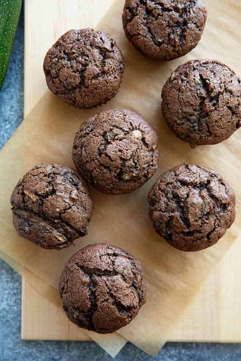 Filled with chocolate and a hint of spice, these Chocolate Zucchini Muffins are a great way to use up that bountiful zucchini harvest. Zucchini Muffins Chocolate, Zucchini Chocolate Muffins, Muffins Zucchini, Muffins Chocolate, Zucchini Chocolate, Chocolate Zucchini Muffins, Zucchini Muffins, Chocolate Zucchini, Chocolate Muffins