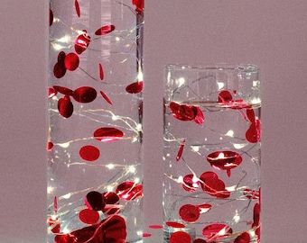 FloatingPearlsllc - Creators | Designers - Etsy Red Centerpieces For Party, Vase Decorations, Floating Centerpieces, Red Confetti, Cheer Banquet, Quinceanera Centerpieces, Punk Wedding, Red Centerpieces, Warm White Fairy Lights