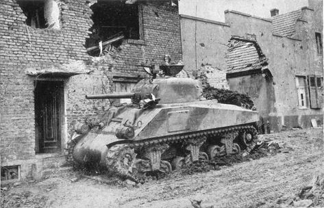 Note: This is probably a Sherman of 743rd Tank Battalion, which was attached to the 30th "Old Hickory" Infantry Division, which was fighting around Palenberg in October 1944. Wwii Tanks, Berlin 1945, Panzer Ii, George Patton, Panzer Iii, Joseph Stalin, Soviet Tank, Ww2 Photos, Panzer Iv