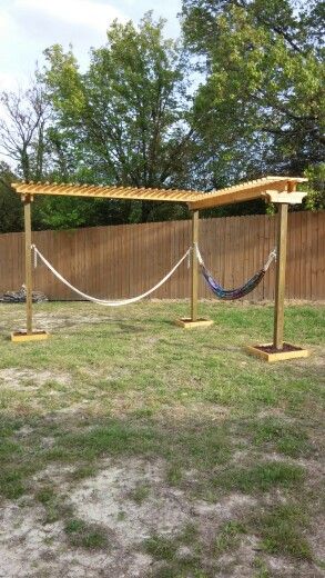 Diy Double Hammock Stand, Multiple Hammock Ideas Backyard, Homemade Hammock Stand, Hammock Area Backyard, Hammock Stand Diy Easy, Outdoor Hammock Ideas, Hammock Pergola, Hammock Posts, Diy Hammock Stand