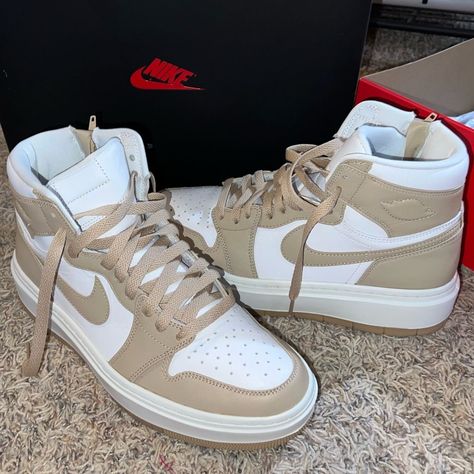 Tan and White Nike High Jordans | Size 10 https://whispers-in-the-wind.com/the-best-shoes-every-man-should-own-essential-footwear-guide/?burberry-sneakers-for-boys-in-cream Nike High Tops Women, Nike Shoes Jordans Women's, Tan Jordans, Jordans For Women, Slay Shoes, Girls Shoes Teenage, Every Man Should Own, Pretty Sneakers, Nike Shoes Air Force