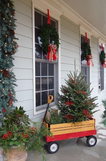 60 Christmas Porch Decor Ideas » Lady Decluttered Christmas Garden Decorations, Decorate For Christmas, Front Door Christmas Decorations, Country Christmas Decorations, Christmas Front Porch, Christmas Porch Decor, Red Wagon, Christmas Garden, Front Porch Christmas Decor