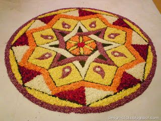 Collection of Onam Pookalam Photos (Images, Pictures, Wallpapers) | designs & sketches Athapookkalam Designs, Onam Rangoli, Onam Pookalam Design, Floral Rangoli, Onam Pookalam, Kolam Art, Poo Kolam, Pookalam Design, Flower Kolam