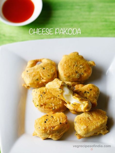 cheese pakoda recipe - a cheesy variation of pakoda are these tasty cheese pakoras. the crisp outer besan coating and the gooey cheesy melted cheese inside are contrasting textures in this recipe. Cheese Pakoda Recipe, Quick Snacks For Kids, Healthy Indian Snacks, Pakoda Recipe, Desi Recipes, Veg Recipes Of India, Pakora Recipe, Veg Snacks, Snacks Appetizers