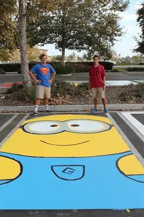 Highschool Parking Spot Ideas Funny, Minion Parking Spot, Guy Senior Parking Spot Ideas, Boy Parking Spot Painting Ideas, Senior Parking Spot Ideas For Guys, Parking Spot Painting Boys, Painted Parking Spots Senior Easy, Senior Parking Space Ideas For Boys, Senior Parking Spot Ideas Funny