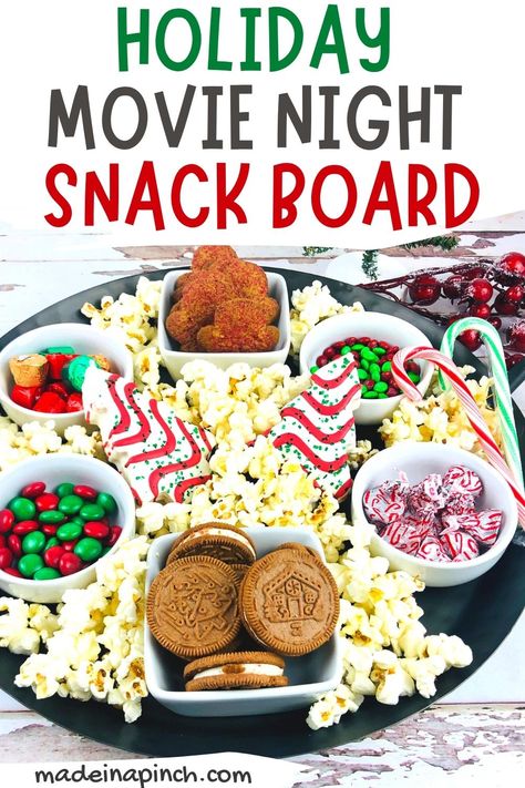 Christmas Snack Tray For Kids, Christmas Snacks For Movie Night, Outdoor Christmas Movie Party, Movie Night Snacks Christmas, Christmas Family Movie Night Ideas, Christmas Movie Night Snack Board, Christmas Movie Night Treats, Kids Christmas Snack Board, Christmas Sleepover Snacks