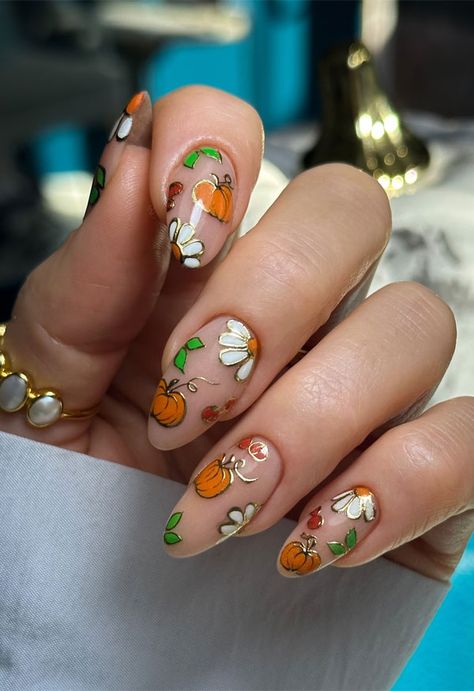 Pumpkin Patch Daisies, fall nails, autumn nail designs Pumpkin Nail Ideas, Cute Pumpkin Nails, Patch Nails, Halloween Pumpkin Nails, Halloween Bat Nails, Easy Fall Nail Designs, Scarecrows Nails, Autumn Nail Designs, Glittery Pumpkins