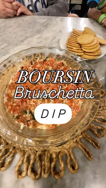 Cara Carroll on Instagram: "✨ Boursin Bruschetta Dip ✨
Not my original recipe. This one’s an oldie, but a goodie! No exact measurements here - just measure with your heart 🫶🏼❤️

You’ll need
✨ Two packages of Boursin cheese (I used shallot + chive )
✨ 3 Roma tomatoes, chopped
✨ fresh basil, chopped
✨ minced garlic 
✨ fresh cracked black pepper
✨ sea salt
✨ Olive oil
✨ Balsamic glaze
✨ shredded Parmesan cheese
✨ shredded mozzarella cheese

Spread Boursin evenly into bottom of a pie dish. Mix together all other ingredients and bake at 350 for 10-15 minutes or until the cheese is a little gooey. Use a slotted spoon to transfer mix evenly over Boursin. Serve with pita chips, butter crackers, crusty French bread, or crostinis. 

Send this to a friend you’d like to share this with and save for Boursin Bruschetta Dip, Boursin Bruschetta, Boursin Cheese Appetizers, Boursin Appetizers, Cheese Chip Dip, Bruschetta Dip, Boursin Cheese Recipes, Crusty French Bread, Chives Recipe