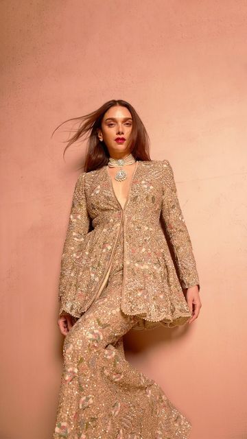 Jayanti Reddy on Instagram: "Our quintessential muse @aditiraohydari graces us in a hand-embroidered peplum and sharara, resplendent in gold sequins and intricate threadwork. A masterpiece of craftsmanship, meticulous detail, culminating in a timeless and dreamy finish.  #JayantiReddyCouture" Peplum Indian Outfit, Peplum Suits Indian, Ali Ansari, Peplum Outfits, Meena Bazaar, Jayanti Reddy, Classy Outfits For Women, Outfits Woman, Indian Bridal Dress