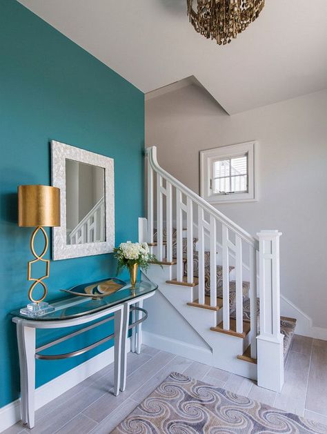 The accent wall paint color is Benjamin Moore Mayo Teal CW 570. The remain walls are painted in “Benjamin Moore Intense White OC-51”. Teal Painted Walls, Teal Accent Walls, Home Wall Painting, Accent Wall Ideas, Blue Accent Walls, Teal Walls, Casa Vintage, Beach House Design, Wall Paint Colors