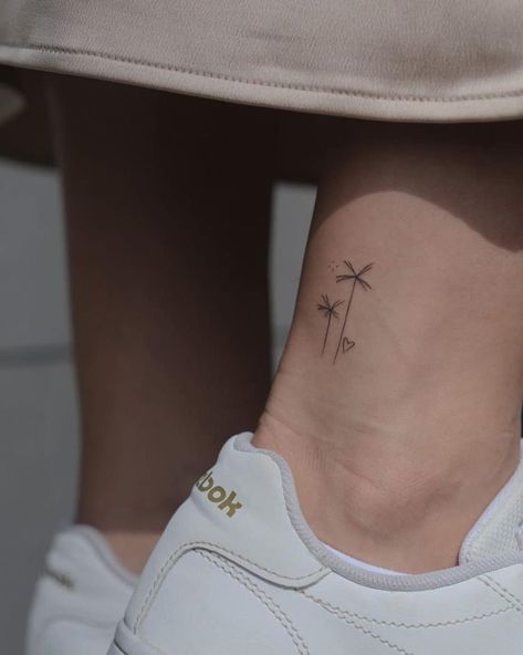 31 Small Ankle Tattoos Ideas for Girls & Women - Style Shepherd Palm Tree And Sun Tattoo, Tree And Sun Tattoo, Line Palm Tree Tattoo, Fine Line Palm Tree, Fine Line Palm Tree Tattoo, Moon And Star Tattoos, Ankle Bracelet Tattoo, Ankle Tattoos For Women, Ankle Tattoos