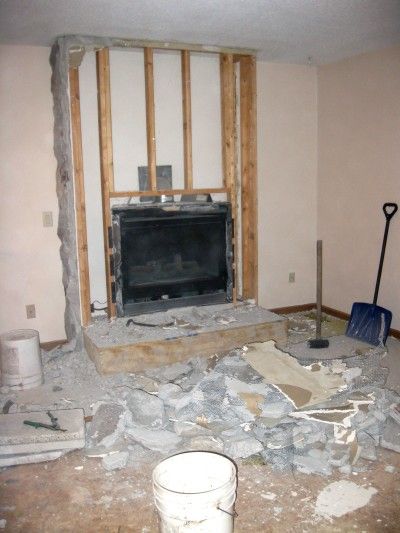 demo the fireplace, construction2style on Remodelaholic How To Update An Old Stone Fireplace, Update Rock Fireplace Living Rooms, Reface Rock Fireplace, Removing Paint From Stone Fireplace, Refinish Rock Fireplace, Fireplace Renovation, Easy Decor, Woodworking Tools Workshop, Brick Fireplace Makeover