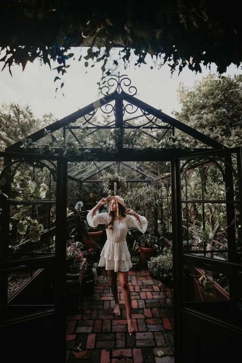 Greenhouse Senior Pictures Boho Hat Dress Photoshoot ideas Plants Barefoot Picture inspo Green House Picture Ideas, Boho Greenhouse Photoshoot, Indoor Garden Photoshoot, Greenhouse Photoshoot Outfit, Greenhouse Photoshoot Ideas, Senior Photos Greenhouse, Senior Pictures Greenhouse, Greenhouse Picture Ideas, Garden Center Photoshoot