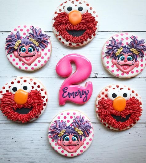 Cotton Lane Bakery on Instagram: “Abby Cadabby and Elmo for sweet Emery! Happy 2nd Birthday! 💕 #cottonlanebakery  #sesamestreetcookies #sesamestreet #abbycadabbycookies…” Elmo Watercolor, Elmo And Abby Cadabby Birthday Party, Abby Cadabby Treats, Elmo Abby Birthday Cake, Abby Sesame Street Cookies, Sesame Street Cookies 2nd Birthday, Girly Elmo Birthday Cake, Abby Cadabby Birthday, Abby Cadabby Party