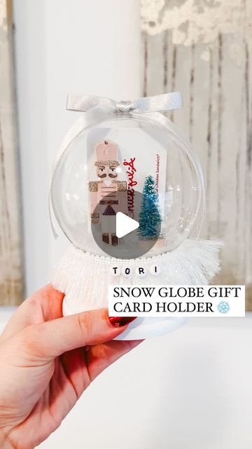 Shelby Parks on Instagram: "How to ✨zhuzh up✨ a gift card!  Comment HOLDER for everything I used to make them!   These snow globe gift card holders turned out soooo cute! I made these for my @orangetheory coaches and was obsessed with how they turned out. Here’s how to make them!   #diy #diycrafts #howto #giftcardholder #giftideas #giftidea #diygifts #diygift #lastminutegift #christmasgiftideas #giftwrappingideas #giftwrapping" Christmas Ball Gift Ideas, Diy Snow Globe Gift Card Holder, Teacher Christmas Gift Ideas Giftcard, Gift Card Ornaments Diy, Snow Globe Teacher Gift, Snowglobe Gift Card Holder, Money Ornaments Diy, Snow Globe Gift Ideas, Diy Christmas Gift For Teacher