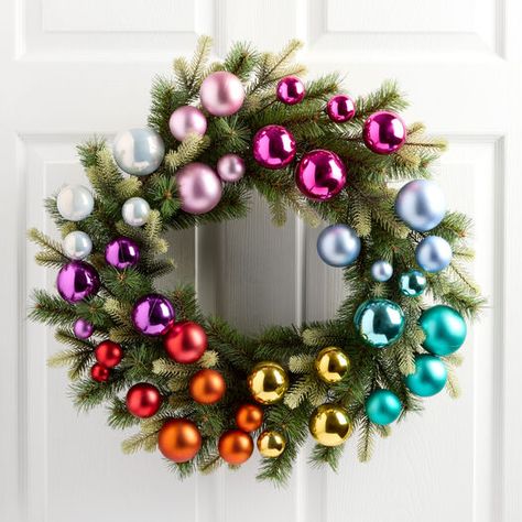 Mixed Faux Greenery with Rainbow Ornaments Wreath by World Market Rainbow Christmas Wreath, Christmas Wreath Themes, Bright Color Christmas, Ornaments Wreath, Rainbow Christmas Tree, Whimsical Christmas Decor, Rainbow Wreath, Rainbow Ornaments, Rainbow Christmas