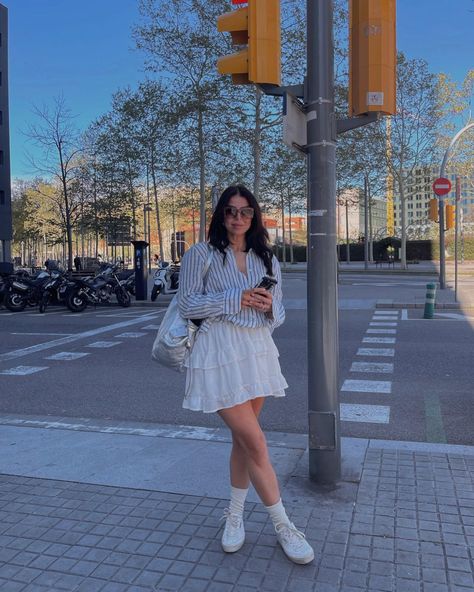 Spring in Barcelona🫶🏼 a little striped shirt, white ruffle skirt , socks , trainers and metallic bag spring outfit ✨ #springfashion #over30style White Ruffle Skirt Outfit, Ruffle Skirt Outfit, White Ruffle Skirt, Metallic Bag, Skirt Socks, Ruffle Skirt, Skirt Outfits, Shirt White, Spring Outfit