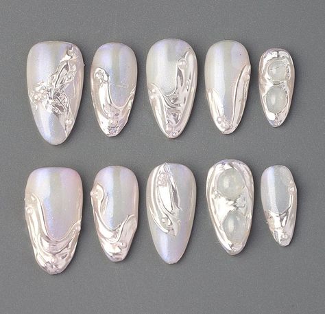 ❤Handmade❤ ❤Unique❤ ❤Reusable❤ ❤Hello, dear. Greetings and welcome to my store. Hope you find a style you like❤ ❤About Product❤ This 3D free style summer white short almond nail design is simple yet elegant, with a pure and fresh white base. The Chrome press on nail, adding a touch of fashion and modernity to the overall design. This summer nail style is perfect for both everyday life and formal occasions, and it can enhance your fingertips with unique charm and refinement, whether paired with c Simple Chrome Nails Short, Silver Press On Nails, Silver Chrome Nails Short, White With Silver Nails, White Chrome Gel Nails, Chrome And White Nails, Silver White Nails, Silver Holiday Nails, Silver Foil Nails