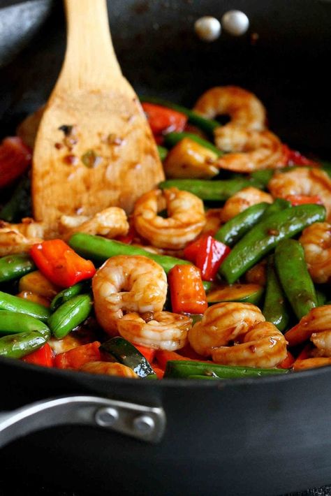 Shrimp, red bell peppers and snap peas being stir-fried in a nonstick skillet. Frozen Shrimp Recipes, Stir Fry Shrimp Recipes, Jasmine Rice Recipes, Healthy Rice Recipes, Vegetable Stir Fry Recipe, Vegetarian Stir Fry, Shrimp And Vegetables, Shrimp Recipes Healthy, Shrimp Dishes