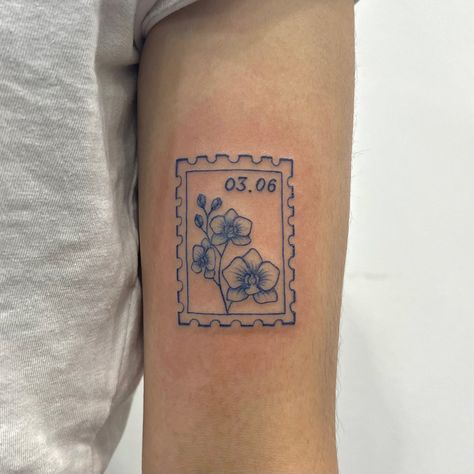 𝕸𝖊𝖌𝖚𝖒𝖎 恵 on Instagram: “Stamp tattoo in blue ink🐬 Thank you so much for the trust Jamille🤍 #stamptattoo #smalltattoo #bluetattoo #orchid #sydneytattoo…” Orchid Stamp Tattoo, Stamp Tattoo Ideas, Mission Tattoo, Post Stamp Tattoo, Medical Tattoos, Postage Stamp Tattoo, Sticker Sleeve, Maching Tattoos, Matching Friend Tattoos