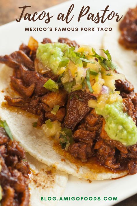 If you are looking for a delicious taco to feed your family on a weeknight or hosting a game night with your friends, these tacos are perfect for any occasion. While it may be difficult to replicate the rotating trompo, it is still possible to make delicious tacos al pastor in your home kitchen. #mexicanfood #mexico #tacos #recipes #amigofoods El Pastor Tacos Recipe Crock Pot, El Pastor Tacos Recipe, Tacos Pastor, Mexico Tacos, Pork Taco, Pastor Tacos, Tacos Recipes, Latino Food, Delicious Tacos