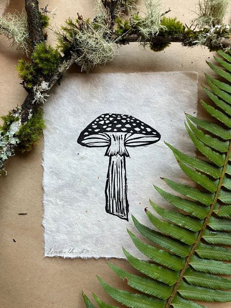 Inspired by the beautiful biodiverse ecosystems that make up the Pacific North West, these 4 x 5 inch mini mushroom prints are the perfect gift. Prints are available on gorgeous ivory handmade Lama Li Lokta paper with black ink. Check out the shop for a discounted Set of 5 of these mushroom prints and other linocut prints and cards, Cheers! Linoleum Print Mushroom, Lino Mushroom, Mushroom Block Print, Mushroom Lino Print, Mushroom Linocut, Botanical Linocut, Block Print Wall Art, Linocut Prints Art, Block Print Wall