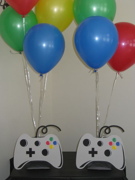 Video Game Party Cupcakes, Gaming Decorations Party, Gamer Birthday Party Centerpieces, Playstation Party Decorations, Video Game Centerpieces, Video Game Baby Shower Ideas, Gaming Centerpieces, Game Decorations Ideas, Gamer Party Ideas