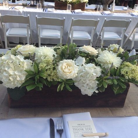 neutral palette of flowers in long wooden boxes Low Centerpieces, Hydrangeas, Roses Wedding Reception Flower Arrangements, Flower Box Centerpiece, Wooden Flower Boxes, Wooden Box Centerpiece, Ideas For Wedding Reception, Wedding Flowers Hydrangea, Flowers Hydrangea, Beautiful Wedding Reception, Deco Champetre