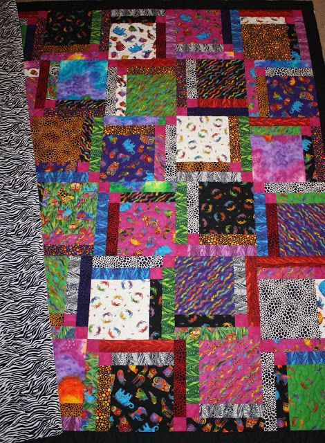 Just Let Me Quilt: Laurel Burch Quilt, Almost Finished Laurel Birch, Laurel Burch Fabric, Panel Quilt Patterns, Laurel Burch, Panel Quilts, Black Thread, Easy Quilts, Jungle Animals, Scrap Quilts