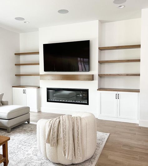 Floating Shelves Tv Fireplace, Trimmed Out Fireplace, Floating Shelves With Cabinets Living Room, Shiplap Fireplace With Tv Built Ins, Half Wall Built In Shelves Fireplace, Built Ins Without Fireplace, Ikea Built In Hack Entertainment Center With Fireplace, Diy Fireplace And Shelves, 2 Story Electric Fireplace Ideas