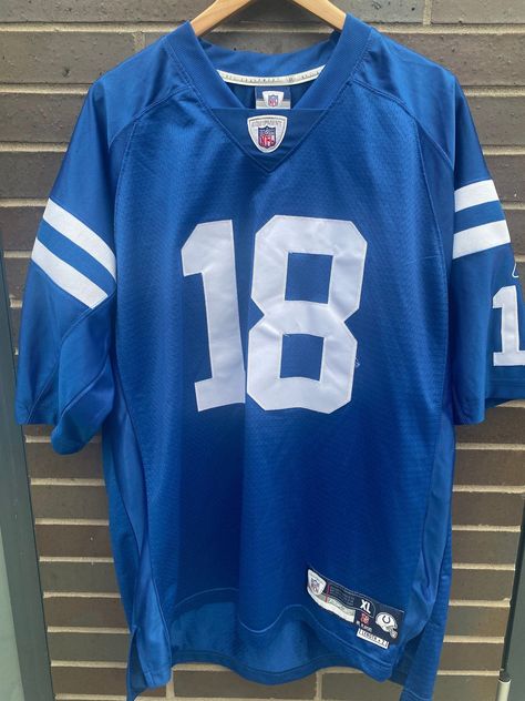 Vintage 2000 Peyton Manning Indianapolis Colts NFL Jersey in size XL (Length 35”, Chest 25”). Great vintage condition with no holes or stains. Message... Peyton Manning Colts, Thrifting Inspiration, Football Costume, Thrift Board, Santa Ideas, Football Jersey Outfit, 2000s Clothes, Football Tops, Nfl Jersey