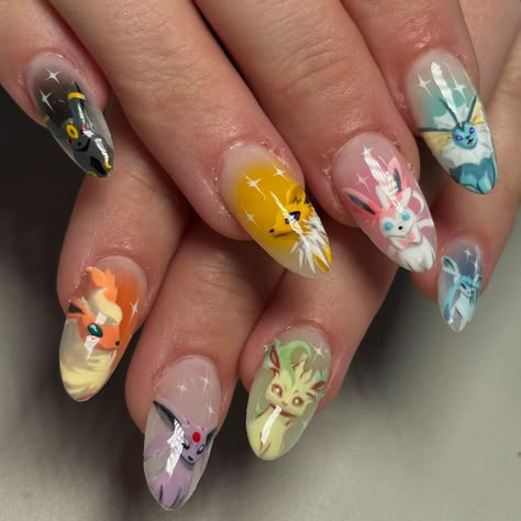 🔥💫🌀💧🖤⚡️🍃 #pokemon #eevee #eeveelution #pokemonnails #nailart #handpainted #characternails #nailartist #gelnails #gelx #apres #auranails #phoenixnails #aznails #nintendo Eevee Nails, Pokemon Nails Designs, Nintendo Nails, Zelda Nails, Pokemon Nail Art, Pokemon Nails, Pokemon Eevee, Pokemon Art, Nail Artist