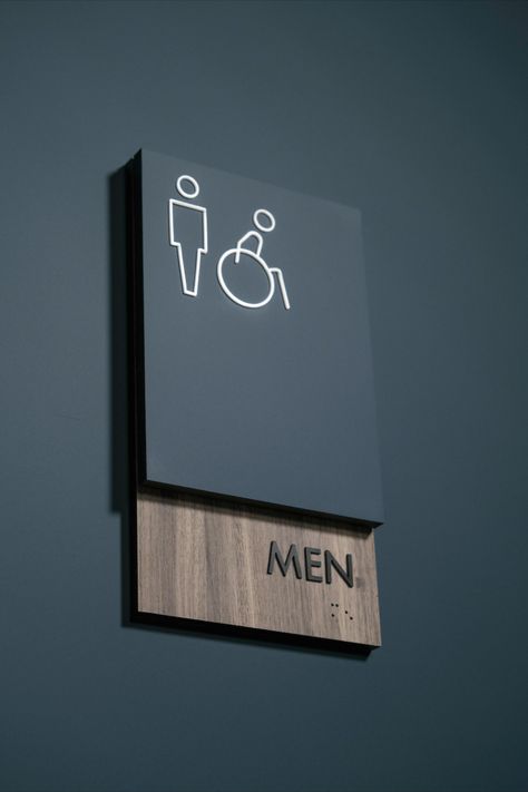 Restroom sign with modern two-layer design using woodgrain and solid laminate. Office Signage Design Interiors, Way Finding Signage Design, Wc Sign Design, Modern Signage Design, Signage Design Ideas, Wc Signage, Office Signage Design, Modern Restroom, Hotel Wayfinding