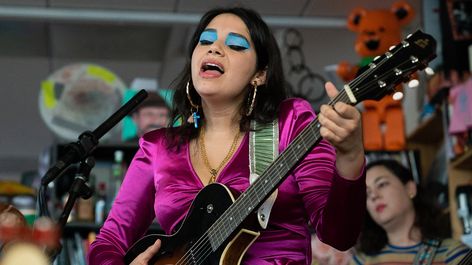 With a great deal of "Salva-Mex-American" pride, Angelica Garcia performs three songs from her album, Cha Cha Palace at the Tiny Desk. Angelica Garcia, Ryan Jones, Tiny Desk Concert, Self Portrait Artists, Tiny Desk, Tiny Desks, Fuchsia Dress, She Song, American Pride