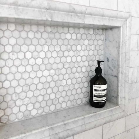 Check out all these great shower tile trim ideas to create the bathroom of your dreams! #arinsolangeathome #homedecor #bathroomremodel #showertile Shower Tile Trim, Tile Trim Ideas, Subway Tile Shower Niche, Shower Niche Design, White Hexagon Tile Bathroom, Hexagon Tile Bathroom, White Subway Tile Shower, Mosaic Shower Tile, Tile Shower Niche