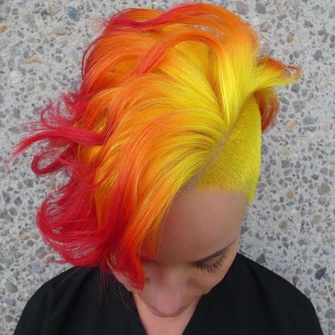 Phoenix rising from the ashes 🔥@madisonjanehair used our #ElectricBanana, #PsychedelicSunset and #PillarboxRed ‼️ - - - @tishandsnooky… Bright Hair Colors Short, Dye Hairstyles, Pixie Mohawk, Phoenix Rising From The Ashes, Flame Hair, Short Punk Hair, Phoenix Hair, Fire Hair, Vivid Hair Color