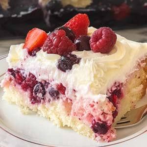 Berries and Cream Poke Cake Recipe - Masters of Kitchen - Recipes Berries And Cream Poke Cake, Italian Cream Poke Cake, Berries And Cream Cake, Slush Cake Recipe, Large Desserts, Berry Poke Cake, Cream Cheese Poke Cake, Raspberry Cream Cake, Raspberry Poke Cake