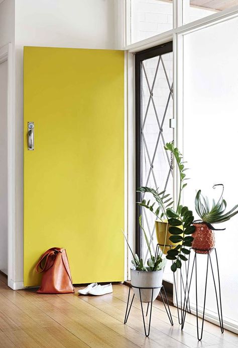 An untouched original with room to grow was the perfect blank canvas to showcase a Melbourne family’s passion for retro mid-century modern style. Weatherboard House, Yellow Door, Yellow Doors, Yellow Interior, Retro Mid Century Modern, Modern Backyard, Room Deco, Retro Home Decor, Door Color