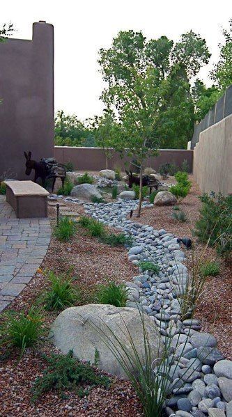 Top 50 Best River Rock Landscaping Ideas - Hardscape Designs Privacy Fence Landscaping, Xeriscape Front Yard, Side Yard Landscaping, River Rock Landscaping, Hardscape Design, Front Yard Design, Creek Bed, Rock Garden Landscaping, Fence Landscaping