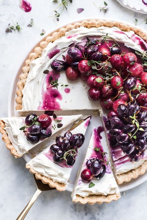 Roasted Grape Mascarpone Tart. Flaky sweet shortcrust pastry casing creamy lemon mascarpone topped with honey thyme roasted grapes. This tart will blow your mind in how tasty it is. This roasted grapes are insanely delicious. By Emma Duckworth Bakes #dessert #tart #pie #mascarpone #roastedfruit #grapes Mascarpone Tart, Lemon Mascarpone, Roasted Grapes, Lemon Meringue Tart, Mascarpone Cream, Fruit Dessert Recipes, Easy Pie Recipes, Tart Baking, Pastry Tart