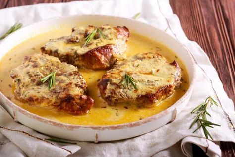 Herb Gravy, Low Carb Pork Chops, Roast Pork Chops, Marry Me Chicken Recipe, Tender Pork Chops, Low Carb Pork, Garlic Spinach, Smothered Pork Chops, Sour Cream Sauce