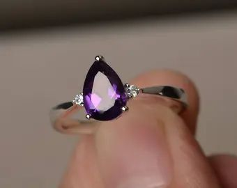 Amethyst ring white gold pear | Etsy UK Teardrop Amethyst Ring, Wedding Ring Pear, Pear Wedding Ring, September Birthstone Rings, Amethyst Ring Engagement, Green Amethyst Ring, Purple Amethyst Ring, Purple Gems, Statement Ring Silver