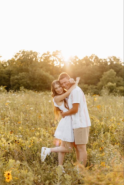 flower field inspired engagement pictures. Flower Farm Engagement Photos, Tulip Field Engagement Photos, Corn Field Couple Photos, Flower Field Pictures Couples, Couple Poses In Field, Sundress Couple Pictures, Tulip Farm Photoshoot Couple, Couple Photos With Flowers, Flower Feild Pics Couple