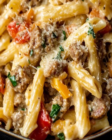 Learn how to make creamy sausage and peppers pasta with this easy recipe. A comforting, flavorful dish perfect for weeknight dinners Sausage And Vegetable Pasta, Creamy Sausage And Peppers Pasta, Sausage And Pasta Recipes Easy, Sausage Peppers And Onions Pasta, Peppers Pasta, Sausage And Peppers Pasta, Sausage Pasta Recipes, Pasta With Sausage, Italian Sausage Pasta