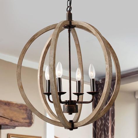 This 4-light orb rustic chandelier, simple black candle light socket are surrounded by distressed sphere wood frame, making it not just a lighting fixture but an eye-catching art piece. It brings much rustic and vintage atmosphere to your room. A special lighting item for kitchen, living room, Foyer, Hallway, hotel, restaurant. Italian Farmhouse Lighting, Farmhouse Chandelier Foyer Entryway, Farmhouse Chandelier Staircase, Staircase Chandelier Modern Farmhouse, Modern Farmhouse Chandelier Bathroom, Wood And Black Chandelier, Foyer Ideas Entryway Lighting, Modern Farmhouse Living Room Light Fixture, Modern Organic Chandelier