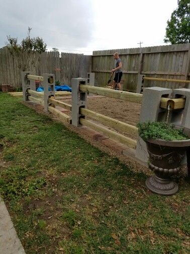 Mike's garden fence I designed, built by nicknme, stain, level, gate, and chicken wire left to go. Made of lowes cinder block and timbers Cinder Block Ideas, Cinder Blocks Diy, Cinder Block Furniture, Fire Pit Materials, Cinder Block Garden, Cinder Blocks, Diy Fence, Cinder Block, Fence Ideas