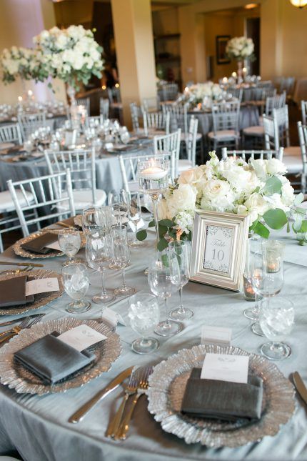 Silver and white table number and reception decor.  Timeless Monogram Wedding Stationery Collection | Agape Planning Elegant White And Silver Table Decor, Silver Table Setting Wedding, White Silver And Gold Wedding, Gray Party Decorations, Silver Wedding Decor, Grey Inspiration, Gray Theme, Rustic Modern Wedding, Rustic Wedding Venues