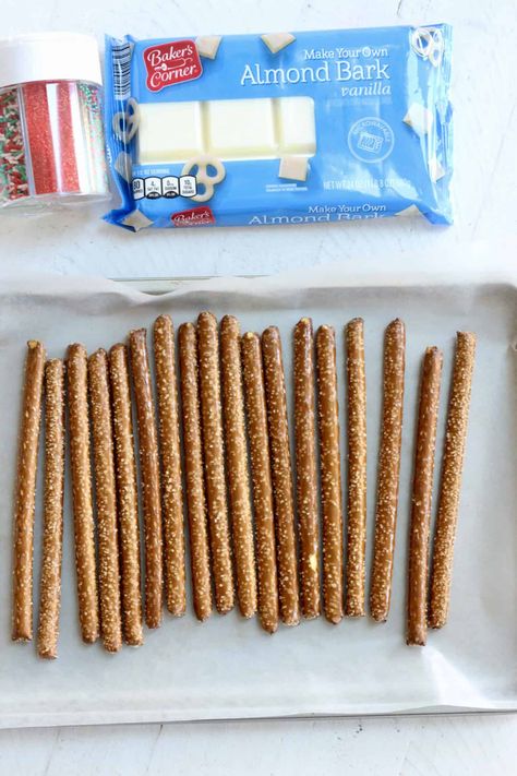 Almond Bark Pretzel Rods, Candy Coated Pretzel Rods, Frosted Pretzel Sticks, Christmas Pretzel Rods Holiday Treats, Candy Coated Pretzels, How To Make Pretzel Rods Dipped, How To Dip Pretzel Rods, Dipped Pretzel Rods Christmas, Dipped Pretzel Rods How To Make