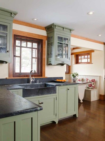 In a newly built house near New Hope, Pennsylvania, for example, designer Bela Rossman of Polo Design Build chose the gray-green stone to co... Crown Point Cabinetry, Cottage Kitchen Cabinets, Rustic Farmhouse Kitchen Cabinets, Cocina Diy, Rustic Kitchen Cabinets, Craftsman Kitchen, Farmhouse Kitchen Remodel, Green Kitchen Cabinets, Farmhouse Kitchen Cabinets